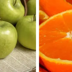 Mele verdi e arancia tagliata a metà. Attenzione, il fruttosio alza la glicemia.