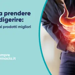 Guida su cosa prendere per digerire meglio. Immagine di uno stomaco e intestino con un'aura rossa, indicando disagio.