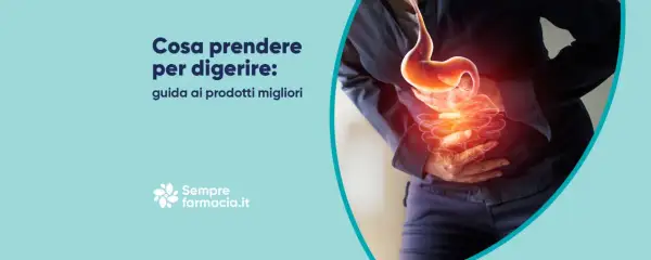 Guida su cosa prendere per digerire meglio. Immagine di uno stomaco e intestino con un'aura rossa, indicando disagio.